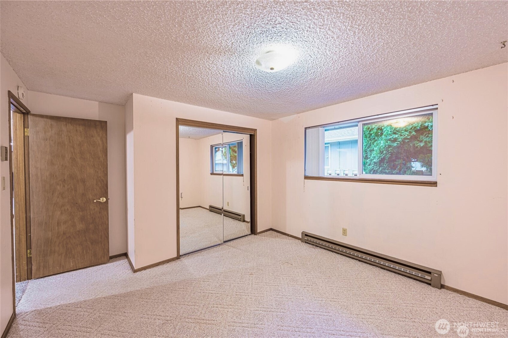 1030 11th Street Port Townsend, WA 98368 - Photo 13 of 21 an empty room with windows