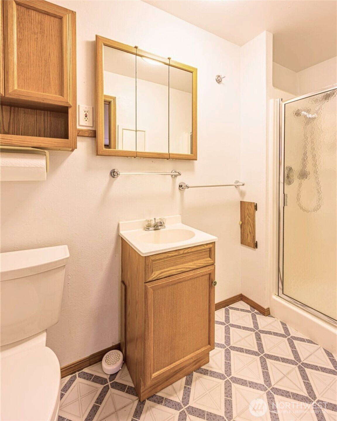 1030 11th Street Port Townsend, WA 98368 - Photo 14 of 21 a bathroom with a sink toilet and shower