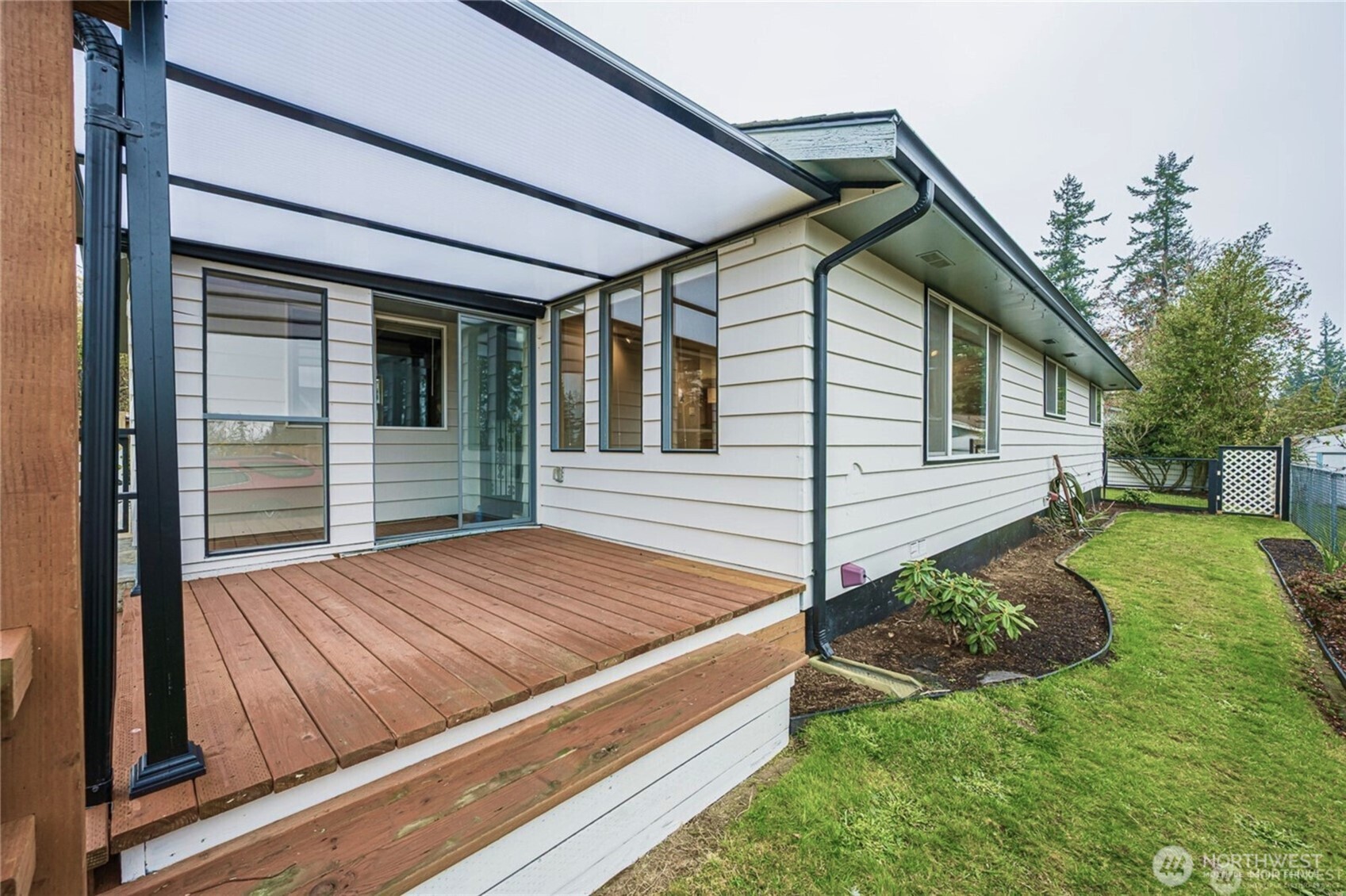 1030 11th Street Port Townsend, WA 98368 - Photo 21 of 21 a view of house with backyard and sitting area