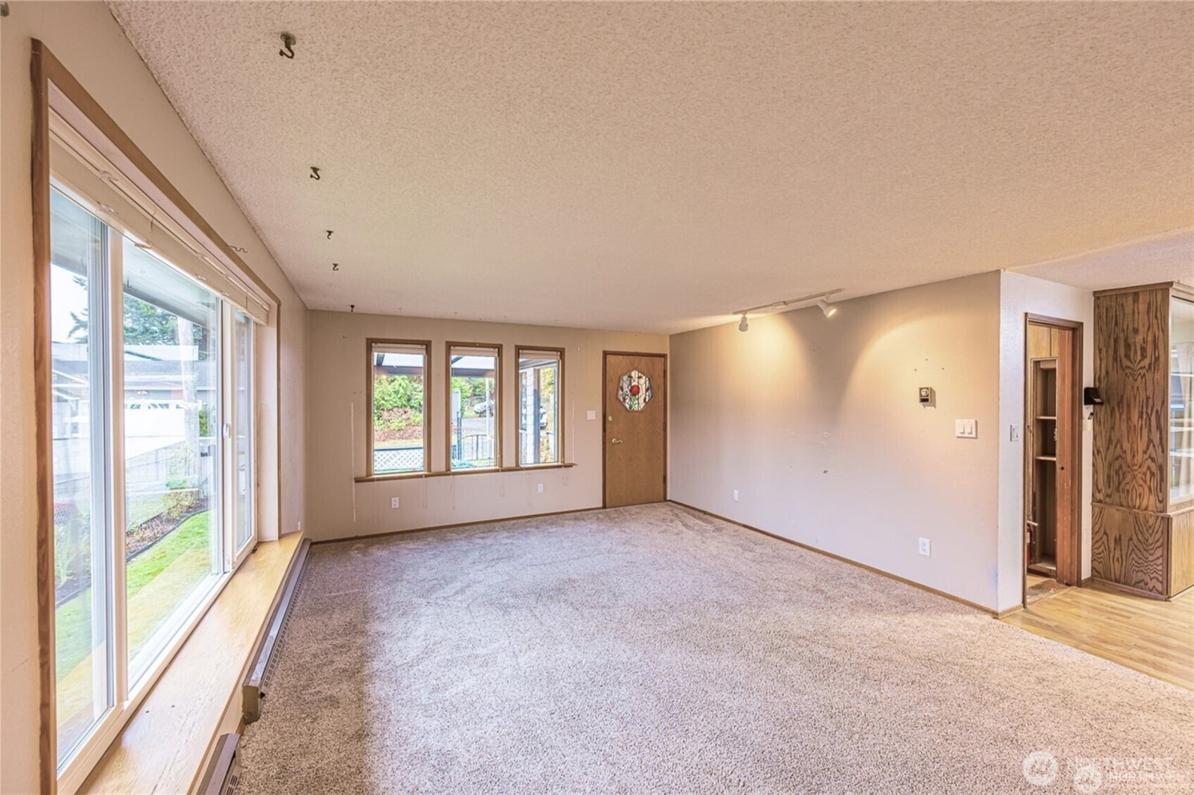 1030 11th Street Port Townsend, WA 98368 - Photo 4 of 21 a view of an empty room with a window