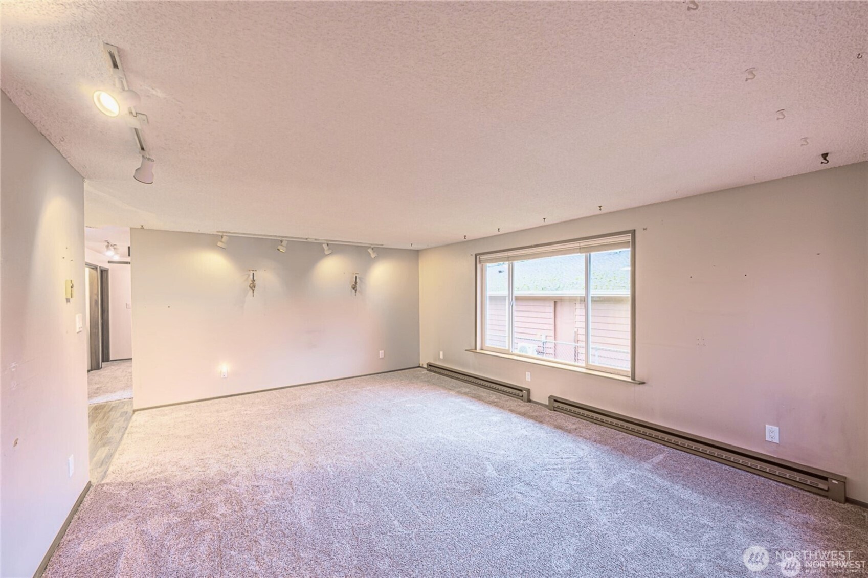 1030 11th Street Port Townsend, WA 98368 - Photo 5 of 21 an empty room with windows