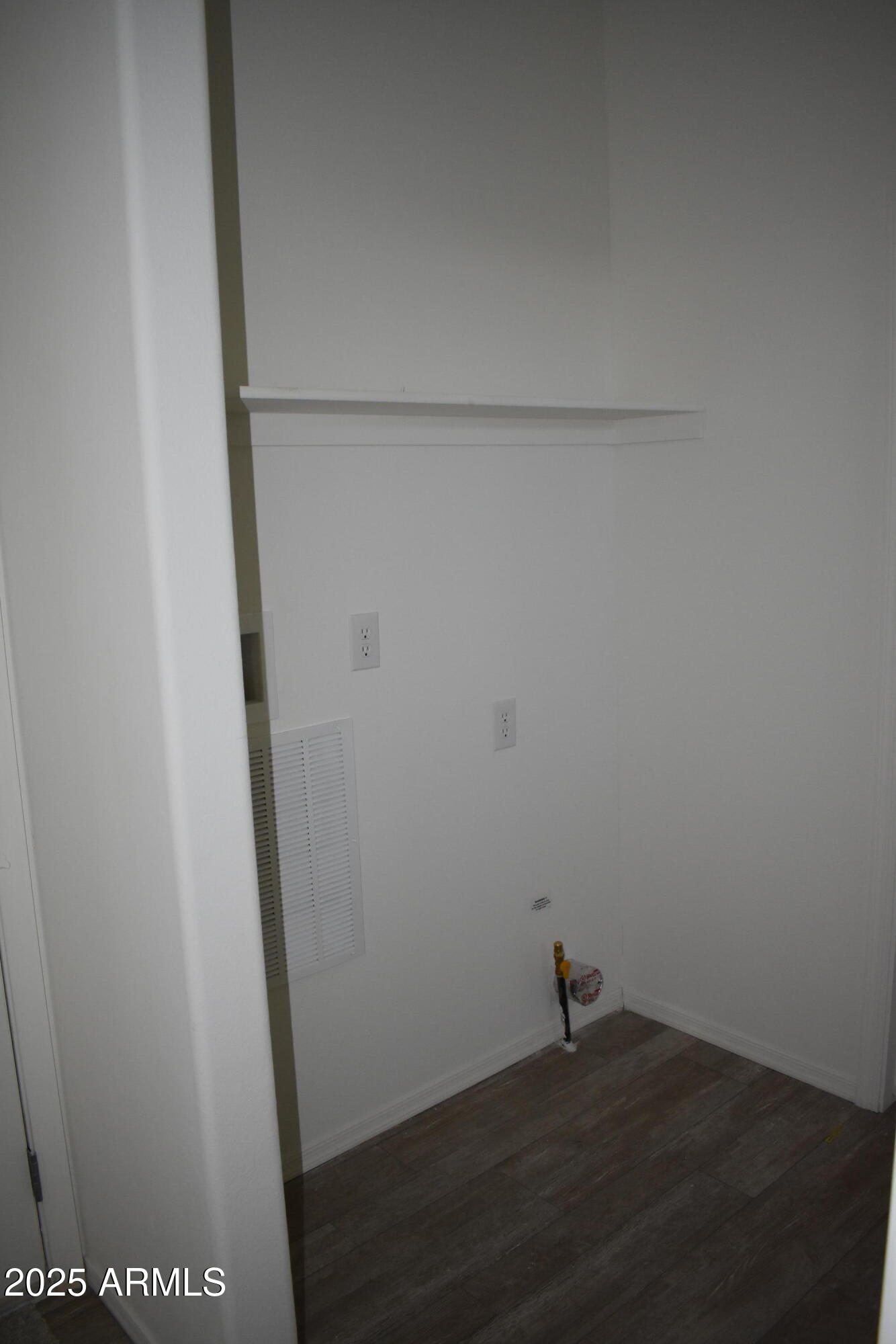 620 West Limberlost Drive, Unit E3 Tucson, AZ 85705 - Photo 12 of 17 a view of small space with wooden floor