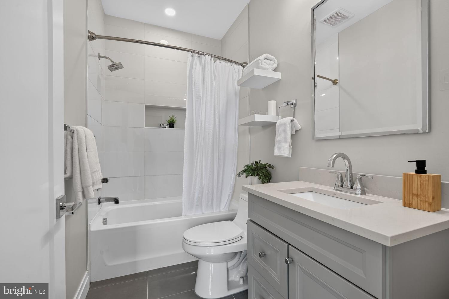 1102 Staples Street Northeast, Unit 301 Washington, DC 20002 - Photo 15 of 23 Modern bathroom with sleek design.