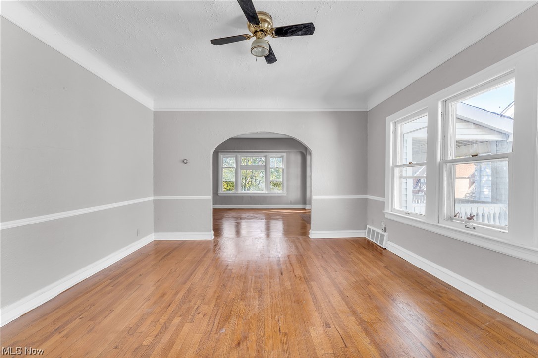 1499 Sherbrook Road South Euclid, OH 44121 - Photo 5 of 41 Spare room featuring light hardwood flooring and ceiling fan