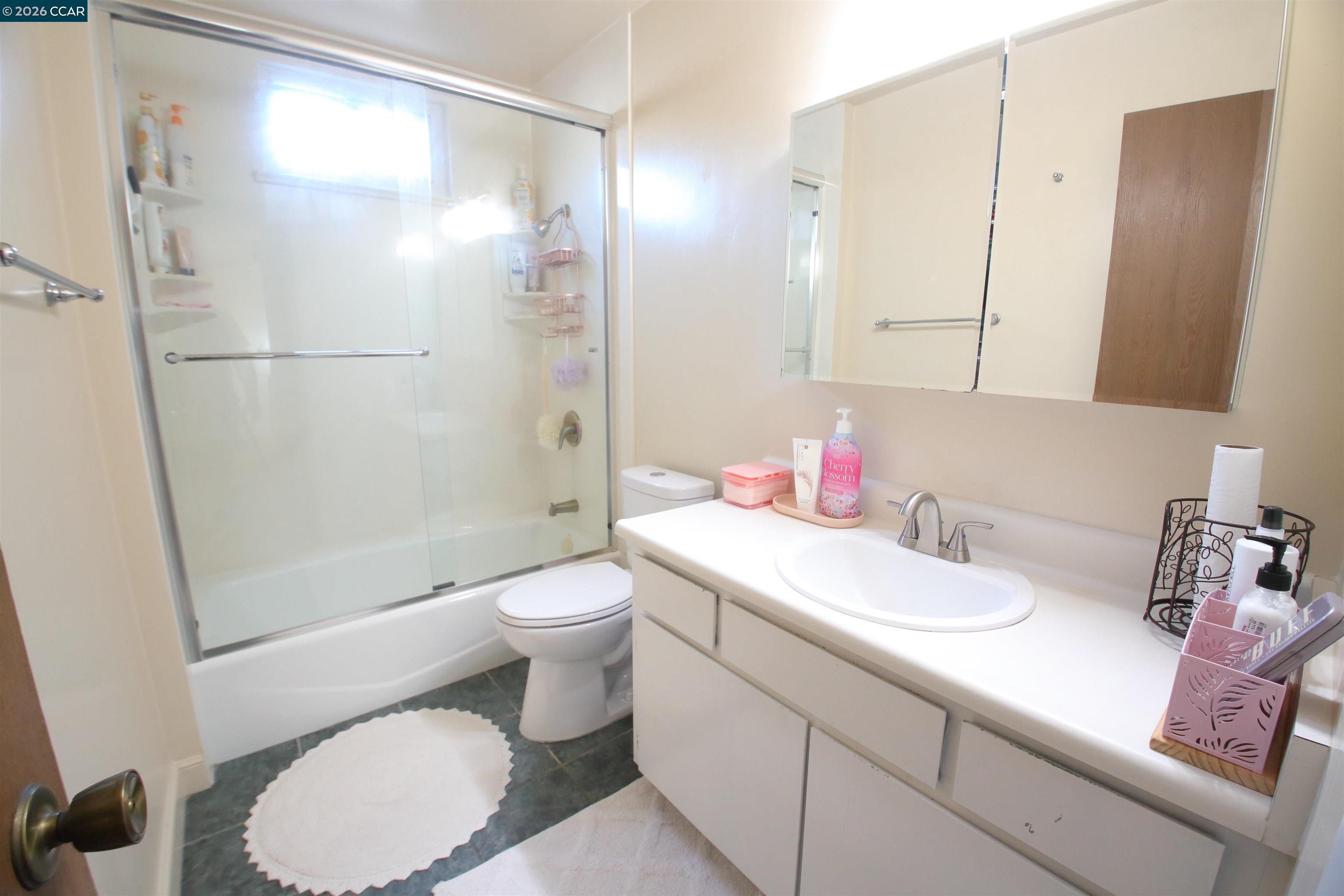 3901 Clayton Road, Unit 25 Concord, CA 94521 - Photo 11 of 28 a bathroom with a sink toilet and shower