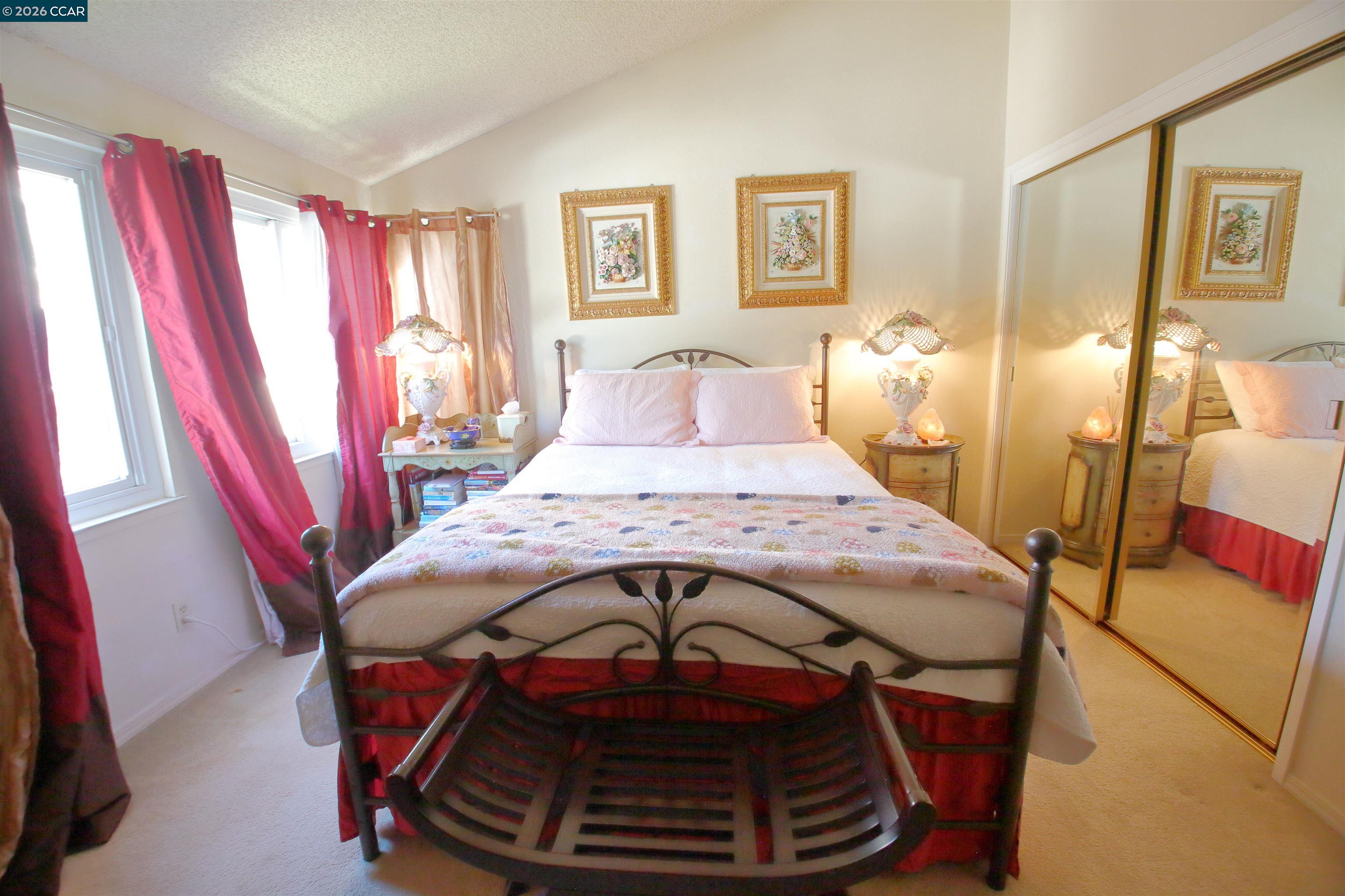 3901 Clayton Road, Unit 25 Concord, CA 94521 - Photo 14 of 28 a bed sitting in a bedroom next to a window