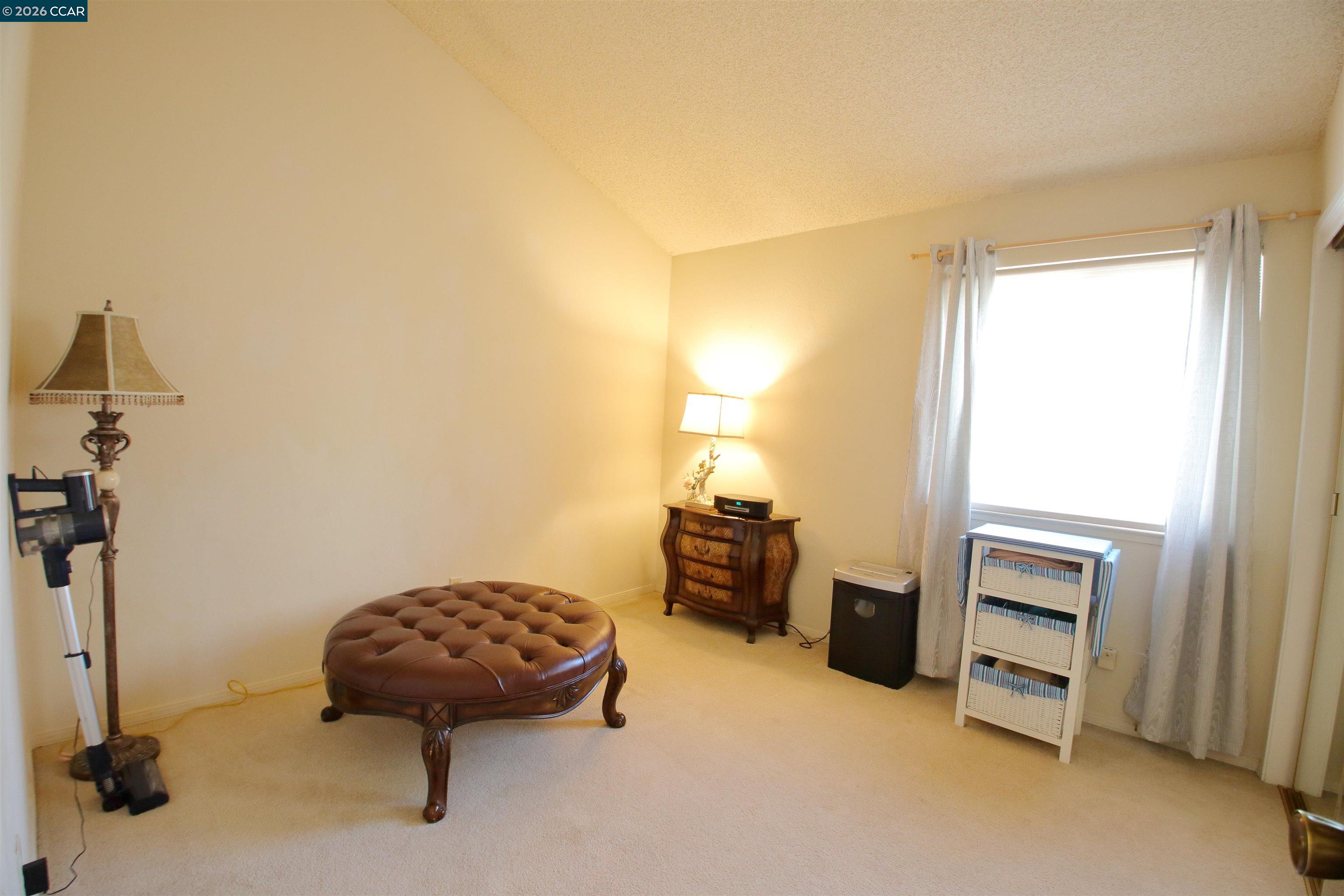 3901 Clayton Road, Unit 25 Concord, CA 94521 - Photo 15 of 28 a bedroom with furniture and a window