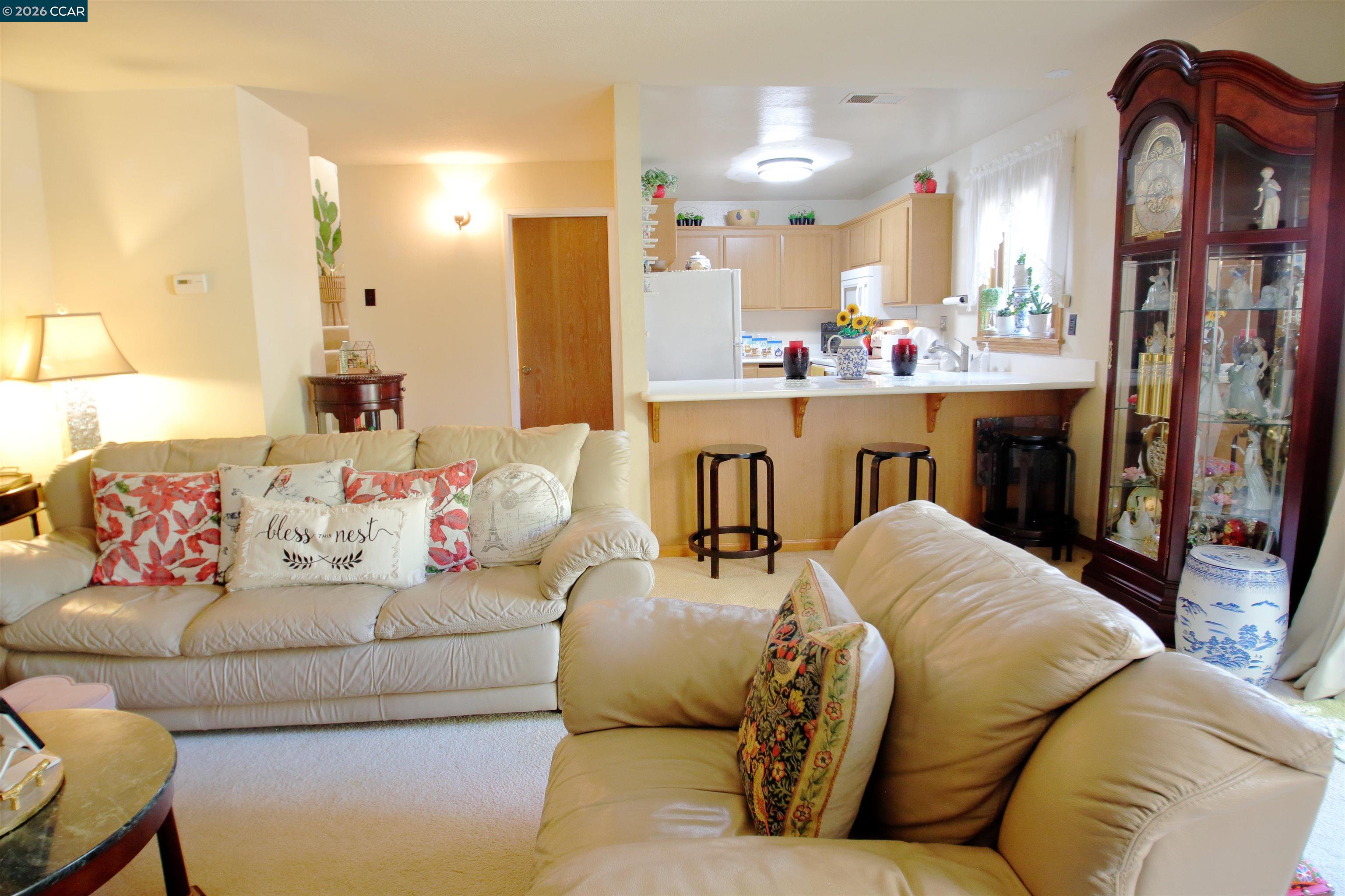 3901 Clayton Road, Unit 25 Concord, CA 94521 - Photo 2 of 28 a living room with furniture and a fireplace