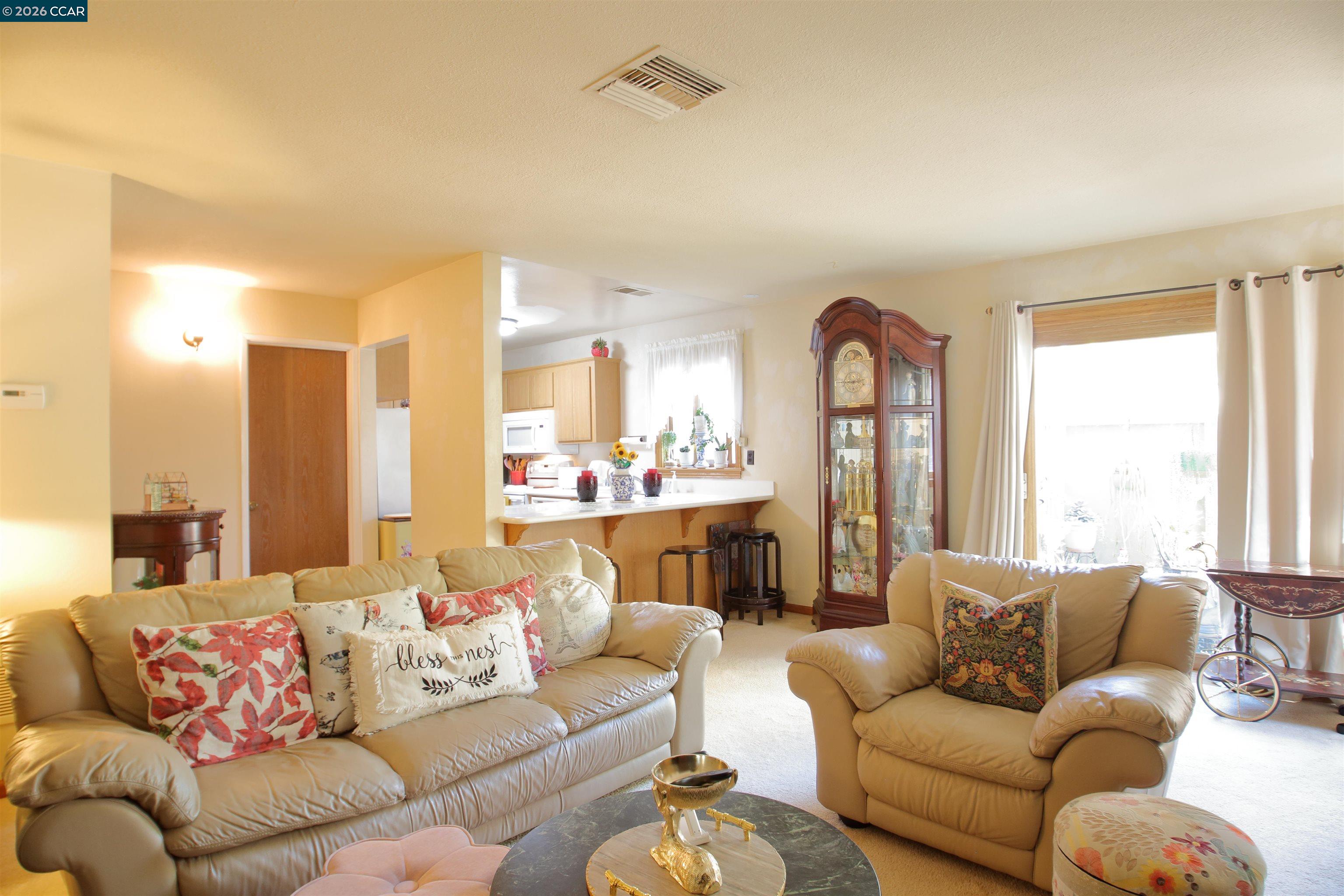 3901 Clayton Road, Unit 25 Concord, CA 94521 - Photo 3 of 28 a living room with furniture and a large window
