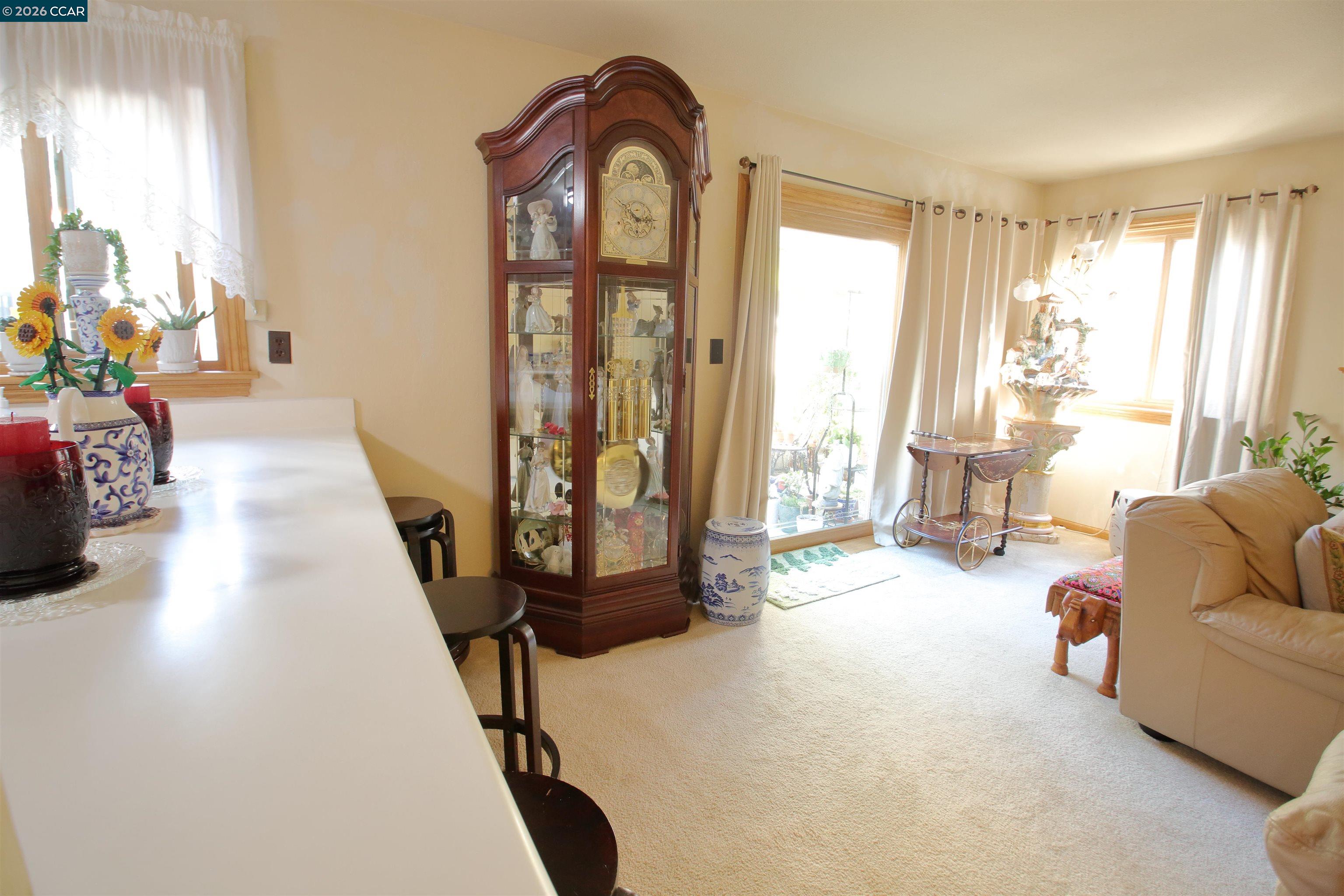3901 Clayton Road, Unit 25 Concord, CA 94521 - Photo 4 of 28 a living room with furniture and a large window