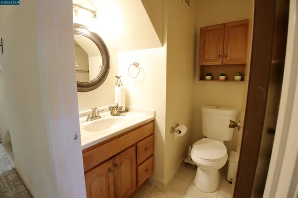 a bedroom with a bed and a closet