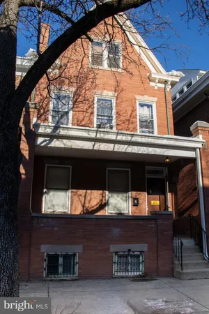 a front view of a building with glass windows