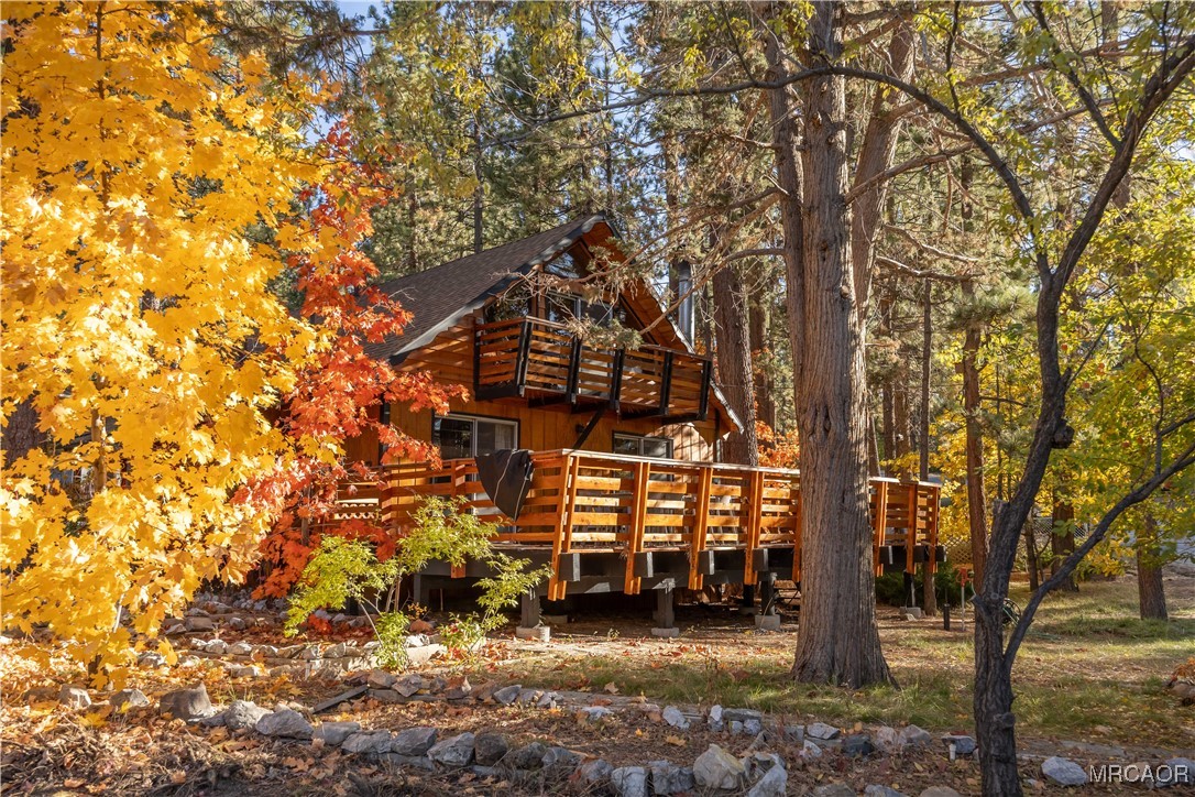 a view of a building with a yard
