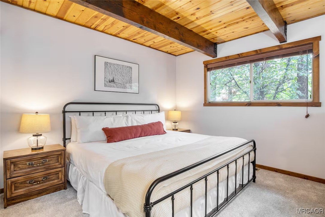 42535 Avalon Road Big Bear Lake, CA 92315 - Photo 13 of 39 a bedroom with a bed and a window