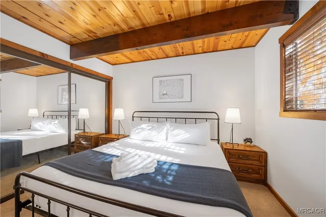 a bedroom with furniture and window