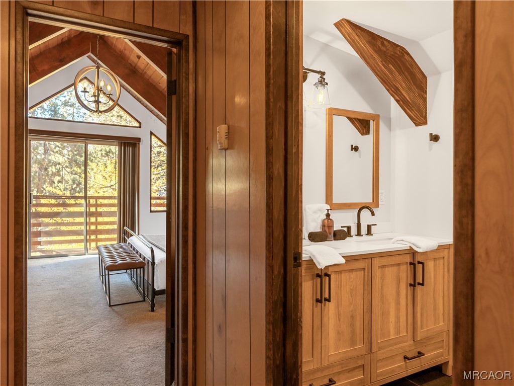42535 Avalon Road Big Bear Lake, CA 92315 - Photo 28 of 39 a en suite bathroom with a sink and a mirror