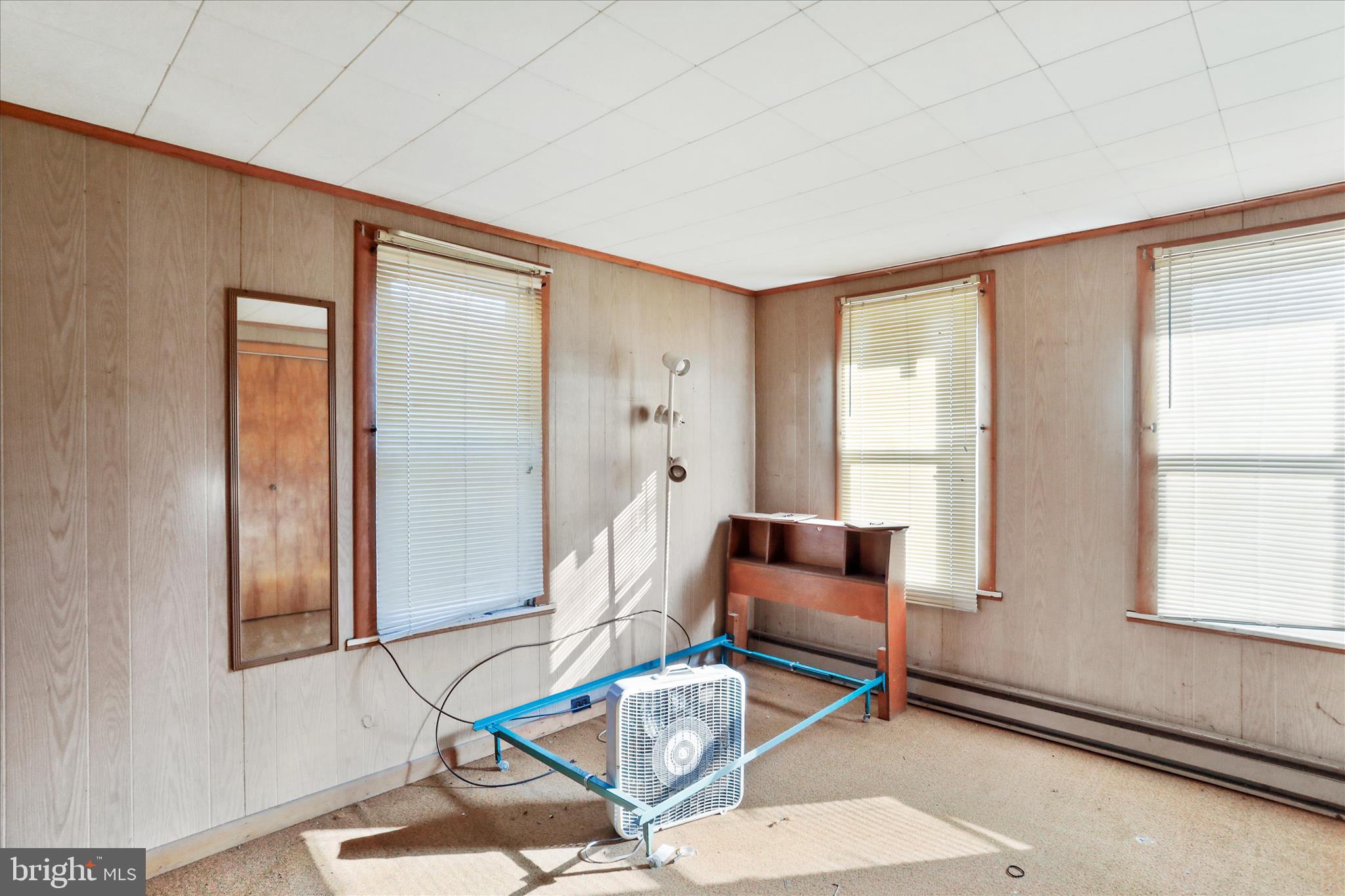 301 Poplar Street Westernport, MD 21562 - Photo 15 of 22 a living room with furniture a window and gym equipment