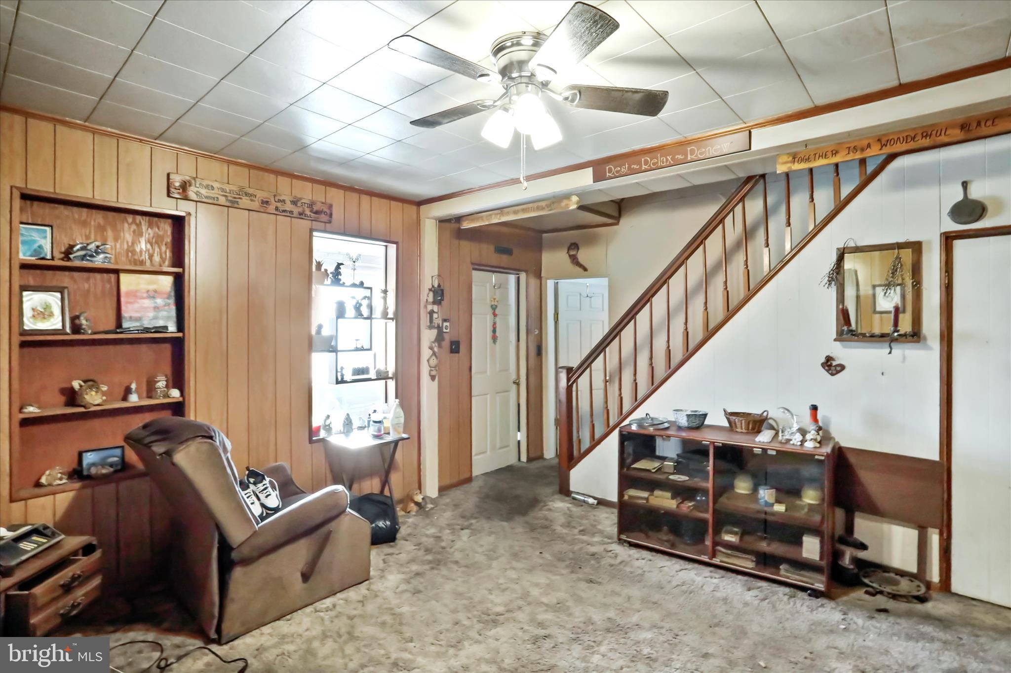 301 Poplar Street Westernport, MD 21562 - Photo 4 of 22 a living room with furniture and a window
