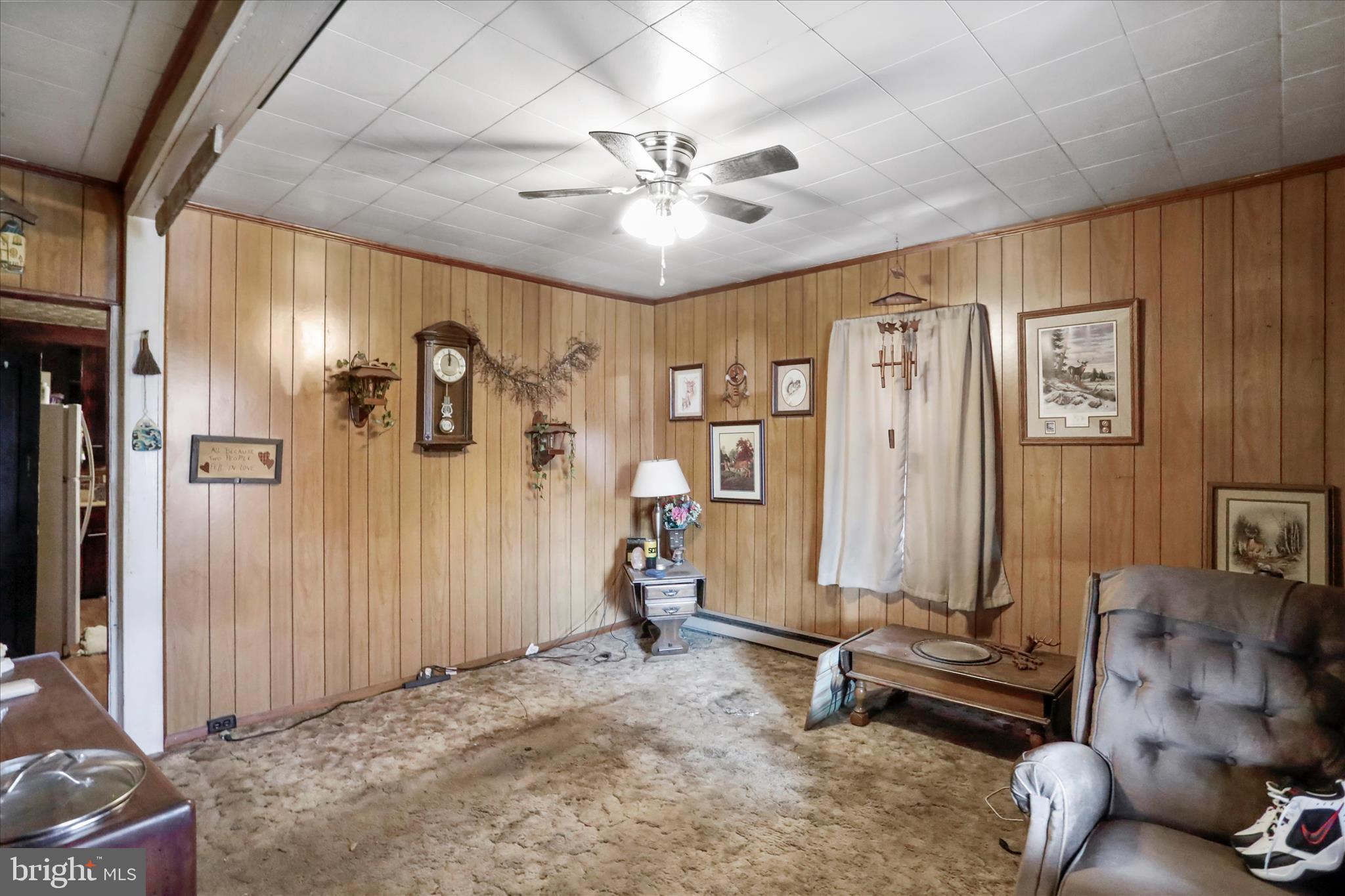 301 Poplar Street Westernport, MD 21562 - Photo 5 of 22 a view of a livingroom with furniture and staircase
