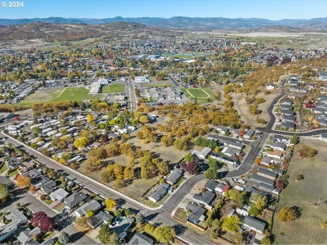 an aerial view of residential building with parking space