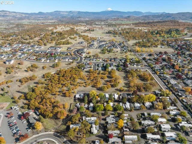 an aerial view of residential house and outdoor space