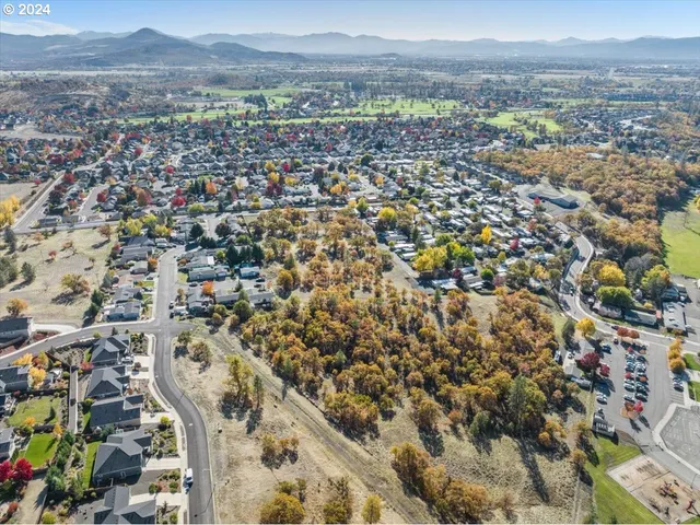 an aerial view of residential building and lake view