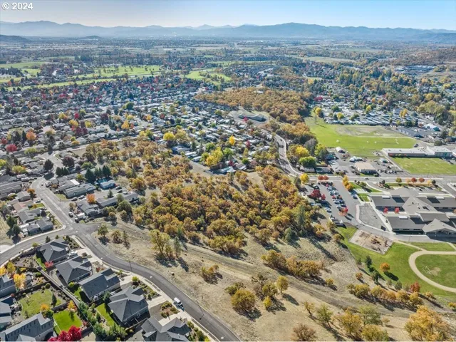 an aerial view of residential building and lake view