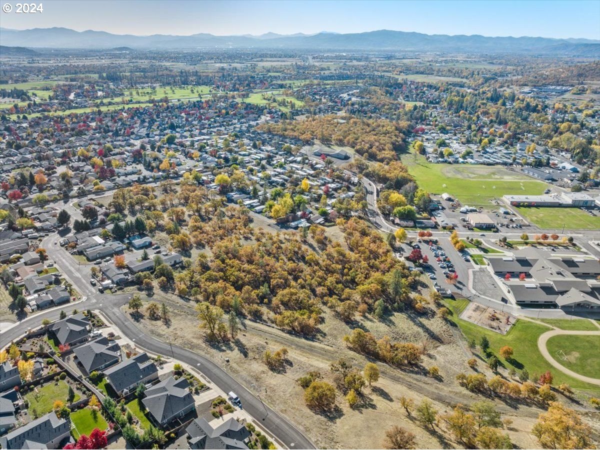 Stevens Road Eagle Point, OR 97524 - Photo 10 of 13 an aerial view of residential building and lake view