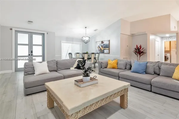a utility room with closet dryer and washer
