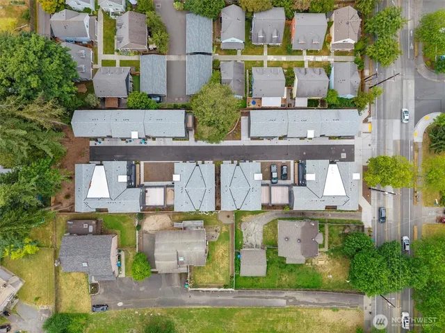 an aerial view of a house with swimming pool