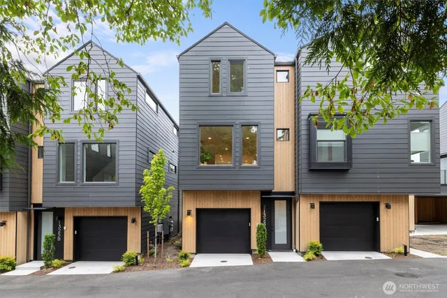 a front view of a house with a garage