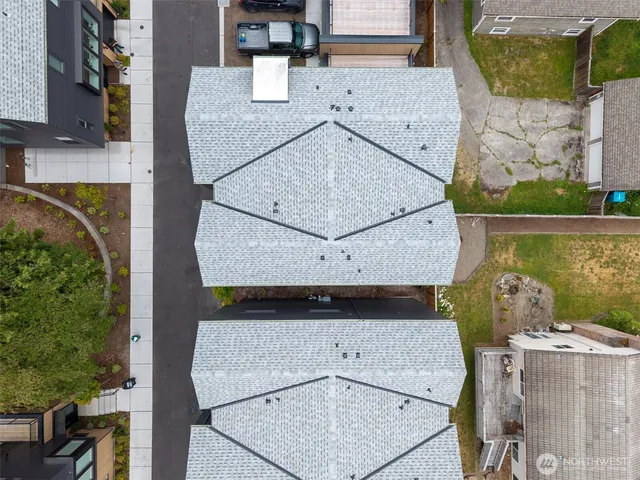an aerial view of a fireplace with sitting area