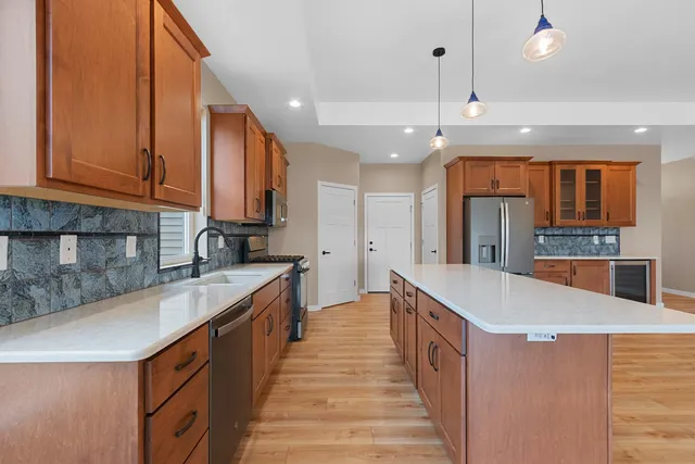 $459,900 | 4884 Wyld Berry Way, Hobart, WI 54155