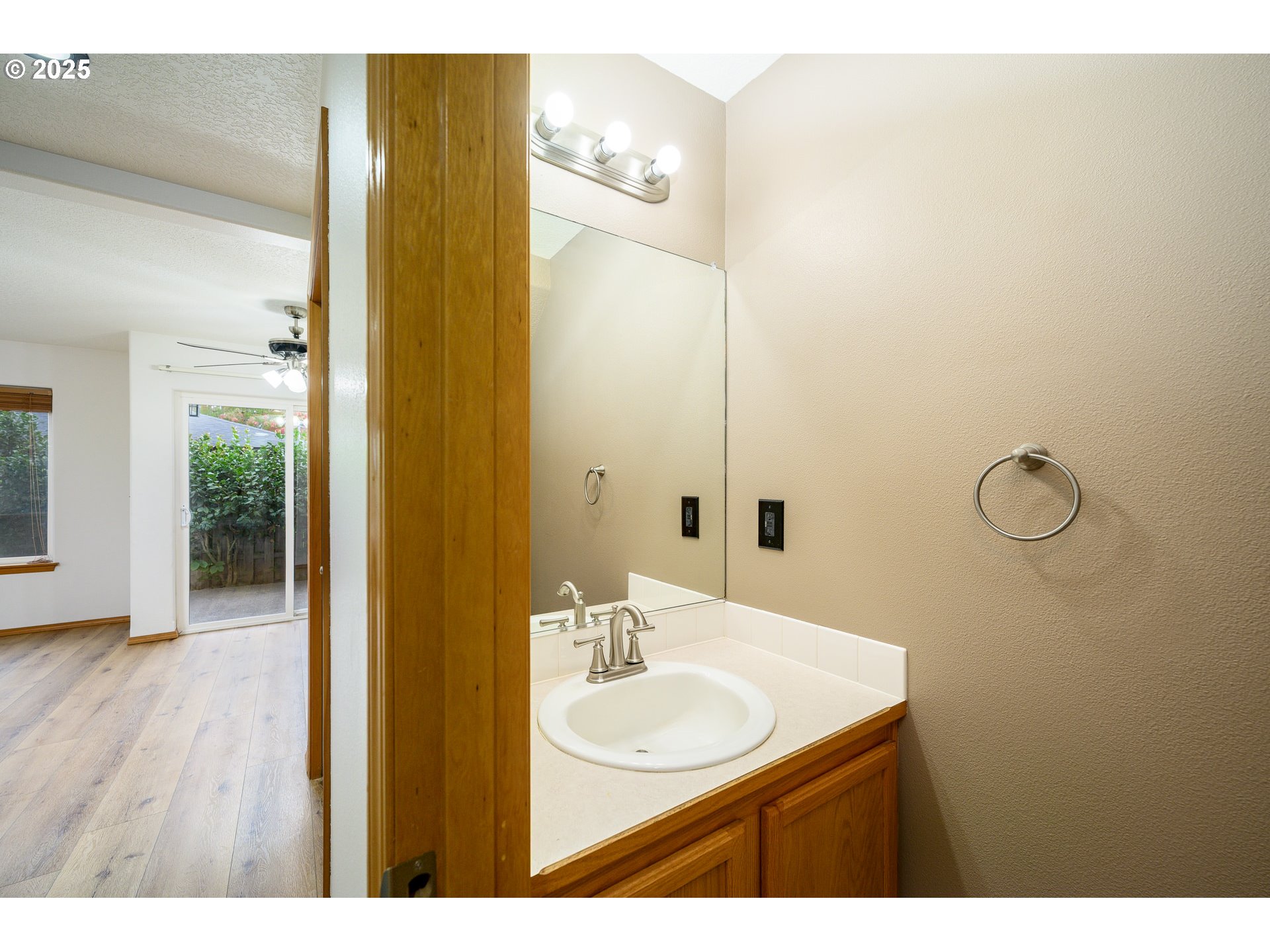 1306 Parkside Lane Newberg, OR 97132 - Photo 17 of 48 a bathroom with a sink and a mirror