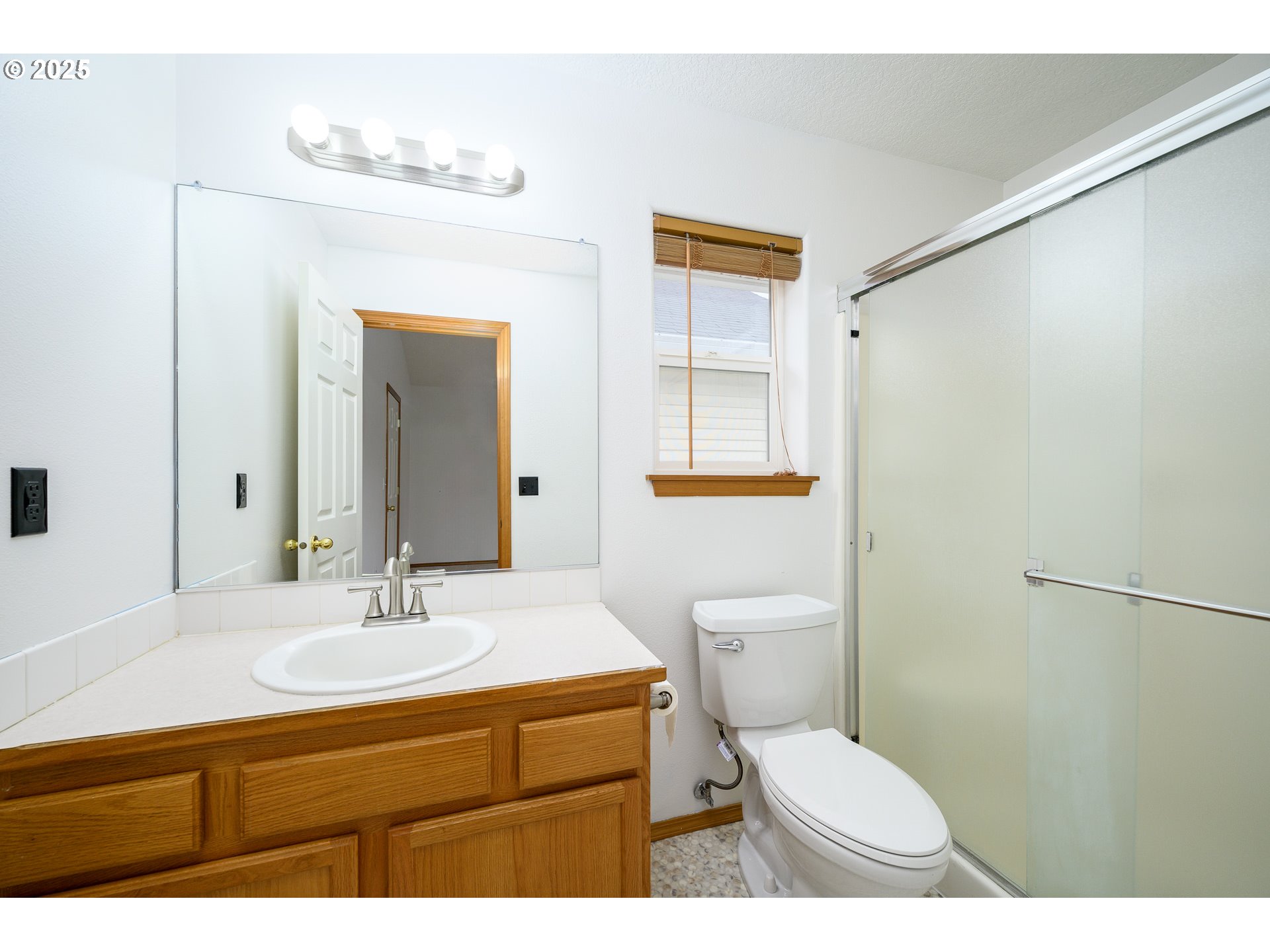1306 Parkside Lane Newberg, OR 97132 - Photo 27 of 48 a bathroom with a sink toilet and shower