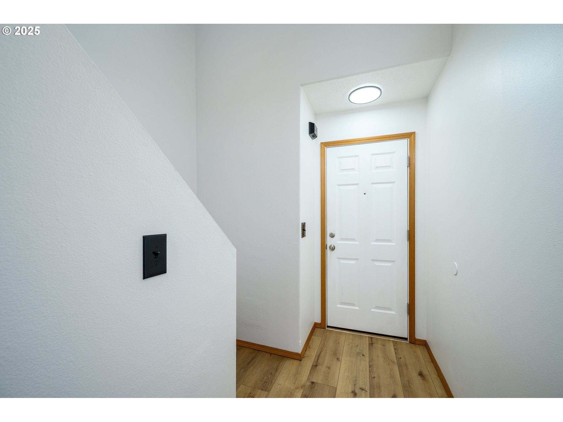 1306 Parkside Lane Newberg, OR 97132 - Photo 4 of 48 a view of a livingroom with wooden floor