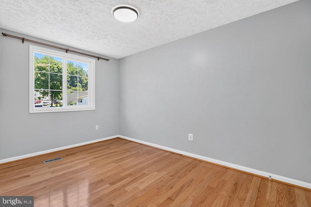 8471 Great Lake Lane Springfield, VA 22153 - Photo 23 of 65 an empty room with a window