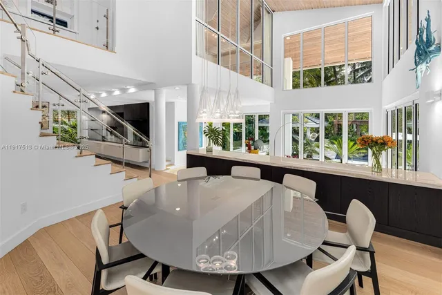 a living room with lots of furniture and a flat screen tv