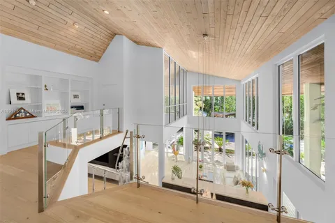 a view of livingroom with furniture and windows