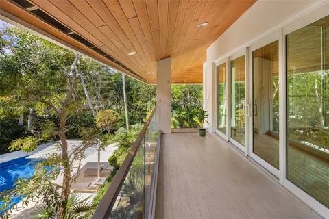 a view of a floor to ceiling window in an outdoor space