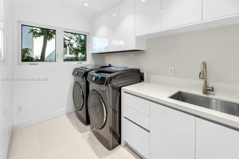 a view of a chairs and table in the patio