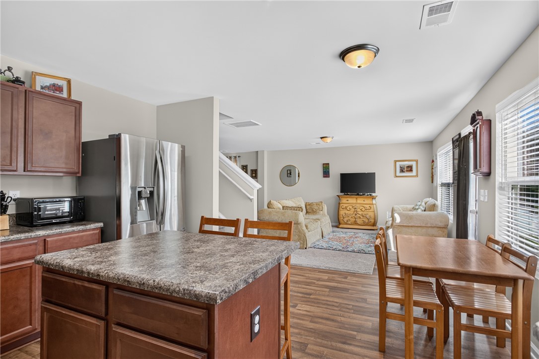1081 Edenbrooke Circle Anderson, SC 29621 - Photo 11 of 46 Functional kitchen island and ample room for dining in this open-concept living space.