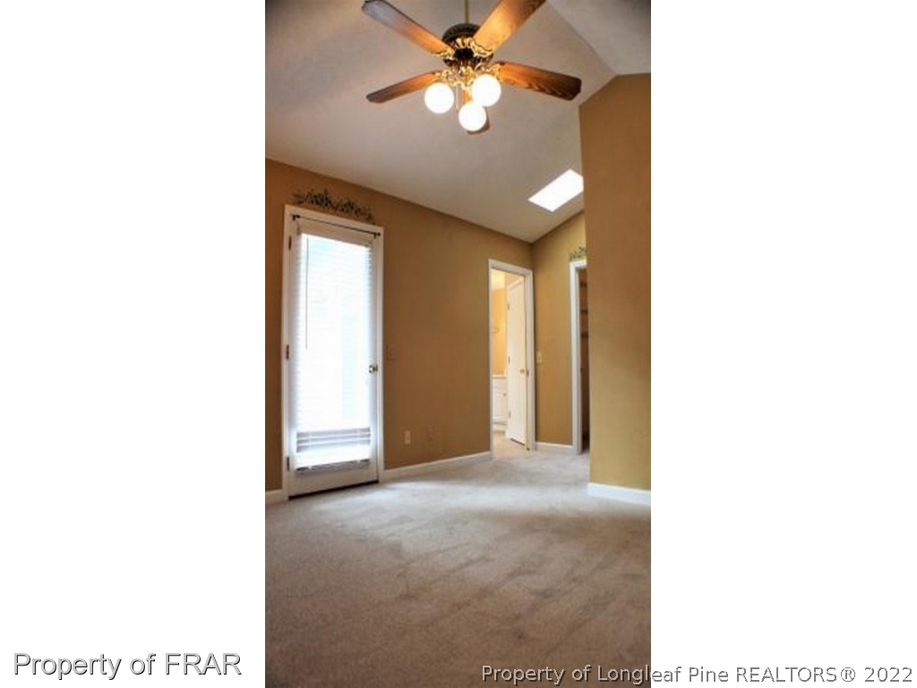 245 Fieldcrest Road Southern Pines, NC 28387 - Photo 12 of 26 a view of an empty room with a window