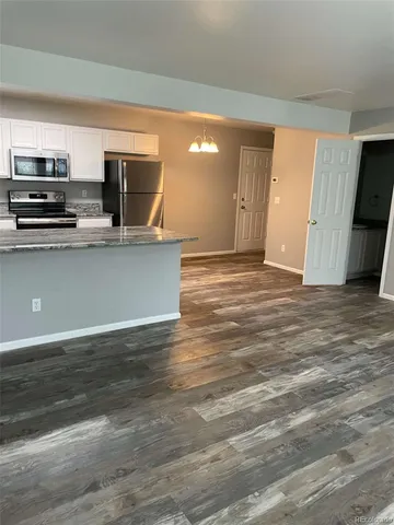 a view of kitchen and microwave