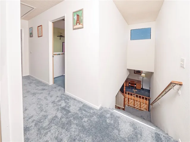 a view of a hallway with a workspace