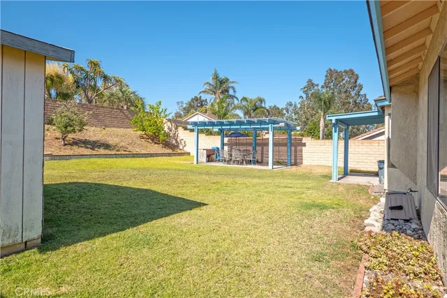 a view of a house with a big yard