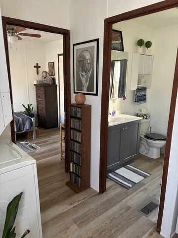 a room with furniture and wooden floor