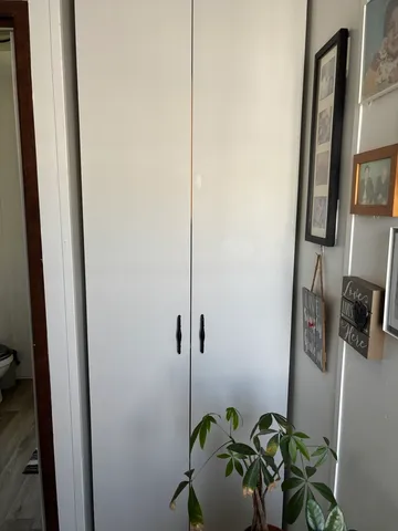 a bathroom with a sink toilet and mirror