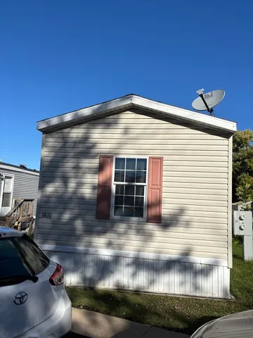 a front view of a house with yard