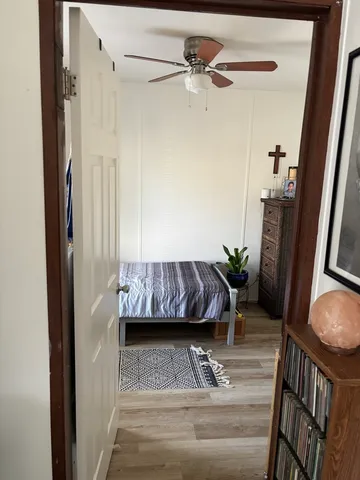 a view of a livingroom with furniture and window